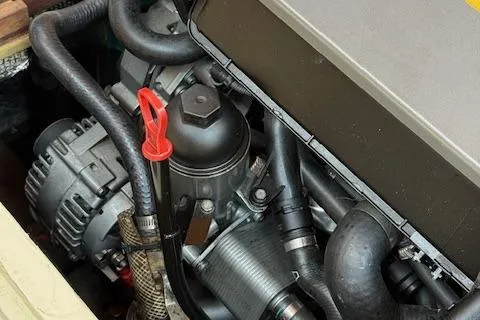 Ilona Yacht Photos Pics Close-up of a 2005 Custom Gannon & Benjamin engine with visible components and hoses.