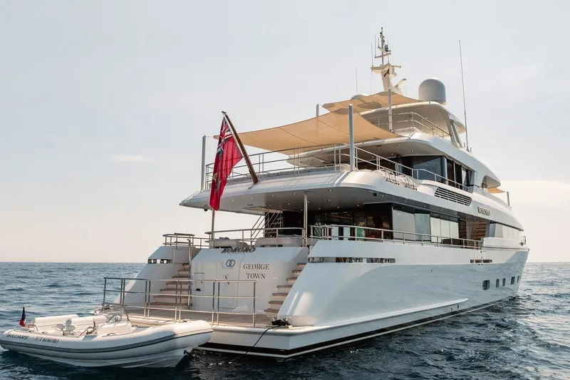 Kokoro Yacht Photos Pics Luxurious 2020 Moonen Martinique YN1 yacht on open sea, featuring elegant design and spacious decks.