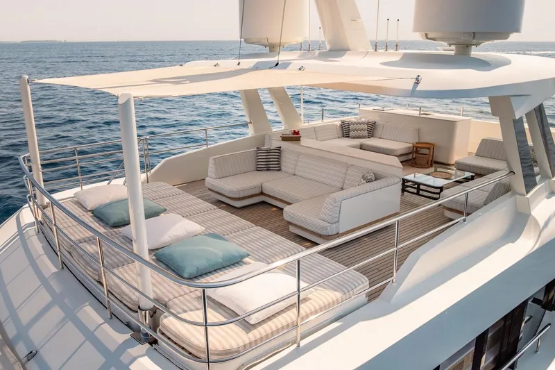 Kokoro Yacht Photos Pics Luxurious 2020 Moonen Martinique YN1 yacht deck with elegant seating and ocean view.