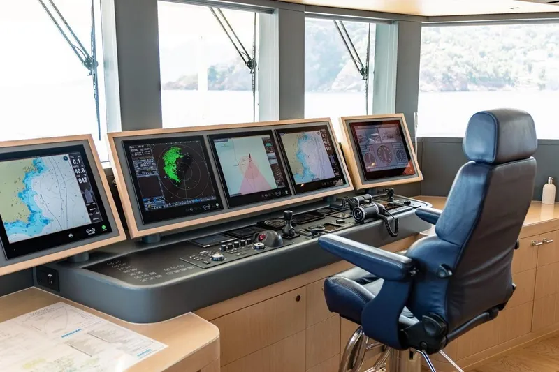 Kokoro Yacht Photos Pics Bridge of 2020 Moonen Martinique YN1 yacht with navigation screens and captain's chair.
