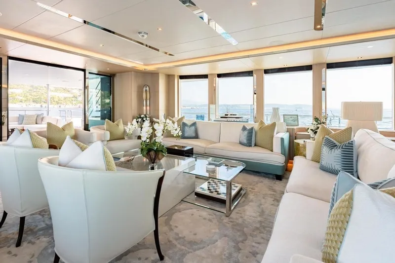 Kokoro Yacht Photos Pics Luxurious interior of 2020 Moonen Martinique YN1 yacht with elegant seating and ocean views.