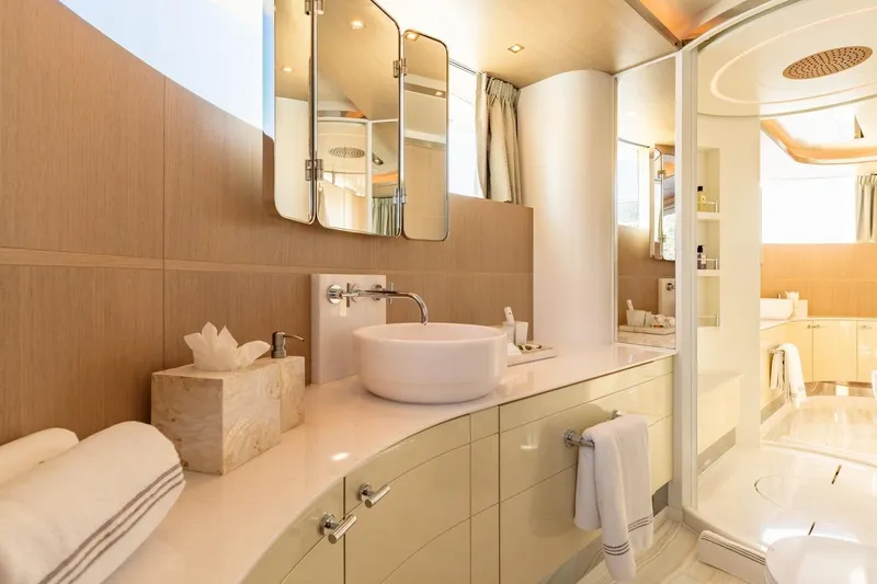 Kokoro Yacht Photos Pics Luxurious bathroom interior on 2020 Moonen Martinique YN1 yacht, featuring elegant fixtures and modern design.