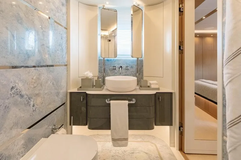 Kokoro Yacht Photos Pics Luxurious bathroom interior on 2020 Moonen Martinique YN1 yacht, featuring modern design and elegant fixtures.