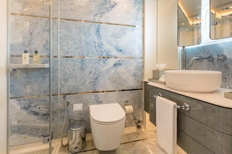 Kokoro Yacht Photos Pics Luxurious bathroom on Moonen Martinique YN1 yacht, featuring elegant marble and modern fixtures.