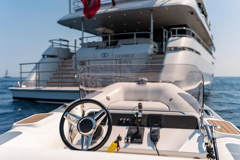 Kokoro Yacht Photos Pics Luxury yacht Moonen Martinique YN1, 2020, with tender steering wheel in foreground.