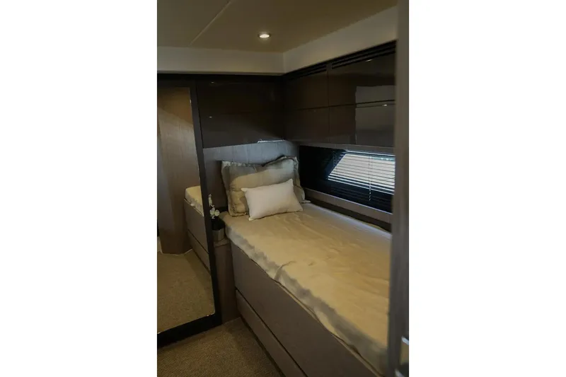  Yacht Photos Pics 2024 Azimut Atlantis 45 yacht interior cabin with bed and modern decor.