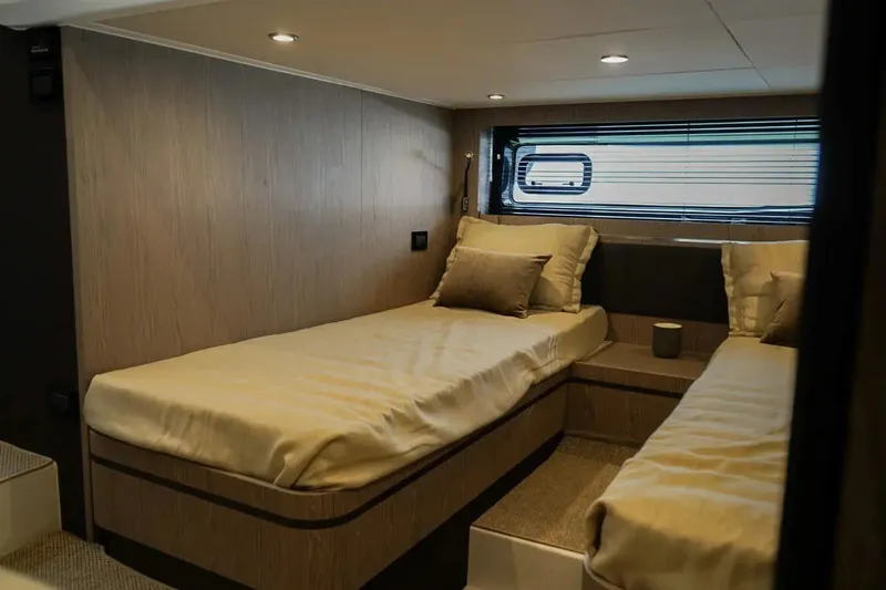  Yacht Photos Pics 2024 Azimut Atlantis 45 yacht interior with twin beds and modern design.