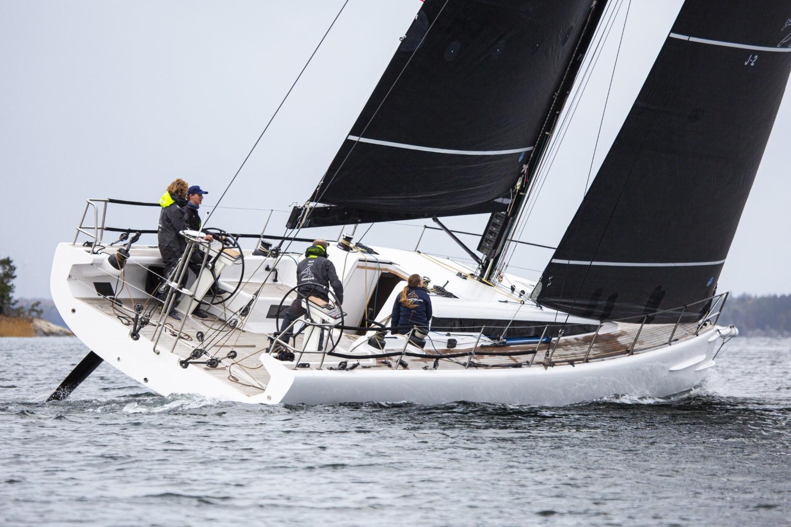 2024 Shogun 50 sailboat with crew navigating on open water.