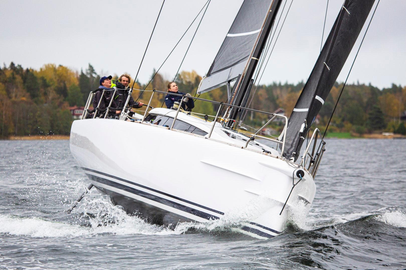 2024 Shogun 50 sailboat navigating through water with crew onboard.