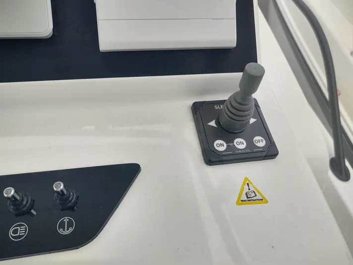 Paul's Legacy Yacht Photos Pics Control panel of 2023 Beneteau Flyer 9 SUNdeck with joystick and switches.