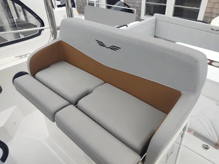 Paul's Legacy Yacht Photos Pics 2023 Beneteau Flyer 9 SUNdeck interior seating with modern design and comfortable cushions.