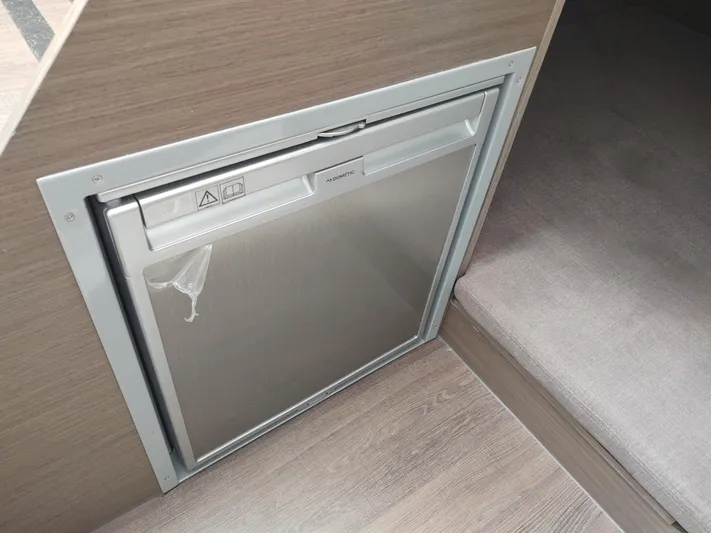 Paul's Legacy Yacht Photos Pics 2023 Beneteau Flyer 9 SUNdeck interior fridge, sleek design, compact, modern finish.