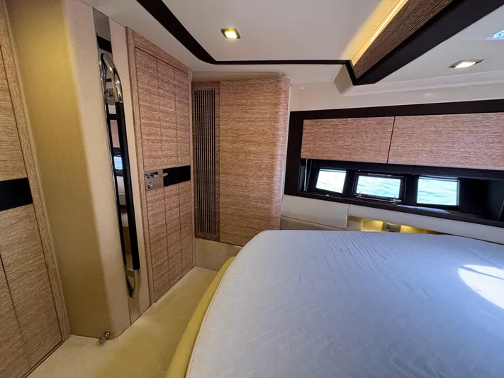 Miss Understood Yacht Photos Pics Luxurious interior of a 2015 Azimut 64 yacht cabin with modern design elements.