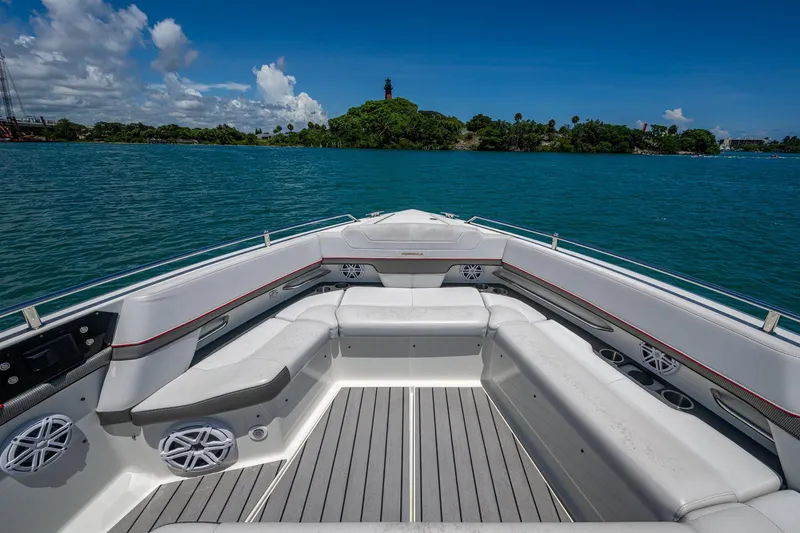  Yacht Photos Pics 2019 Formula 430 Super Sport Crossover boat interior with seating, on a sunny day.