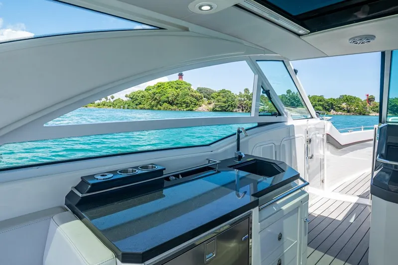  Yacht Photos Pics Luxurious interior of 2019 Formula 430 Super Sport Crossover yacht with ocean view.