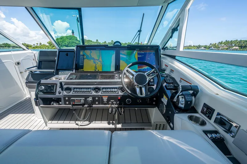  Yacht Photos Pics 2019 Formula 430 Super Sport Crossover helm with advanced navigation system and luxurious interior.