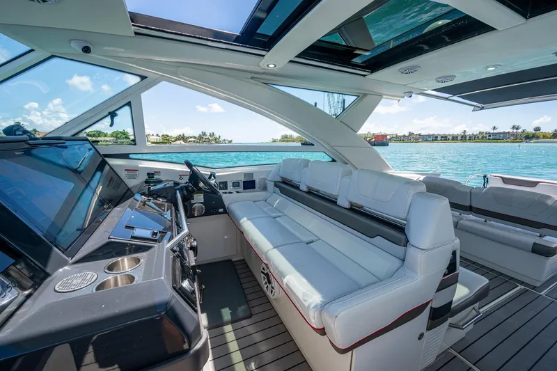  Yacht Photos Pics Luxurious interior of 2019 Formula 430 Super Sport Crossover yacht with spacious seating and modern controls.