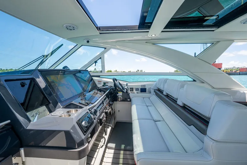  Yacht Photos Pics 2019 Formula 430 Super Sport Crossover cockpit with luxurious seating and advanced navigation systems.