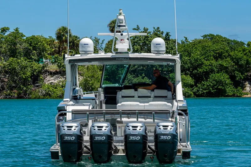  Yacht Photos Pics 2019 Formula 430 Super Sport Crossover boat with four engines on a sunny day.