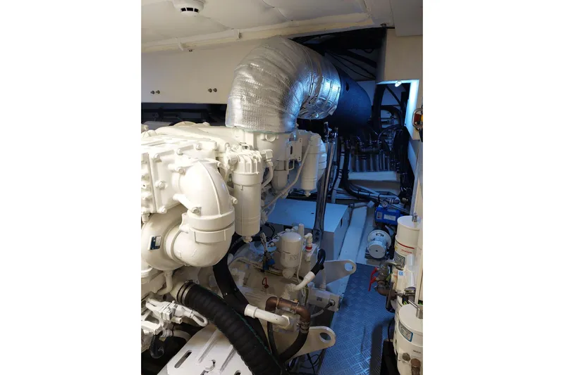  Yacht Photos Pics Engine room of 2021 Ferretti Yachts 670, showcasing advanced machinery and components.