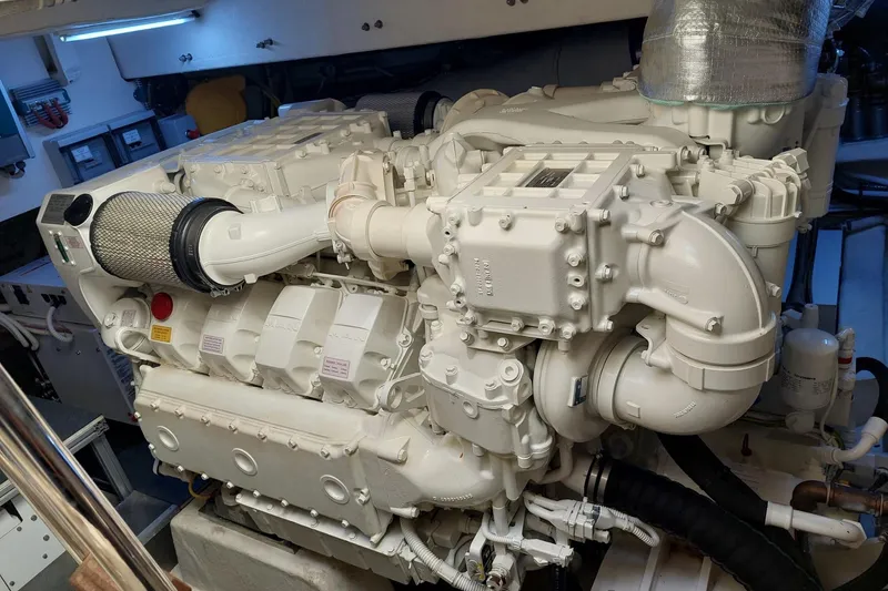  Yacht Photos Pics Engine room of 2021 Ferretti Yachts 670, showcasing a powerful marine engine.