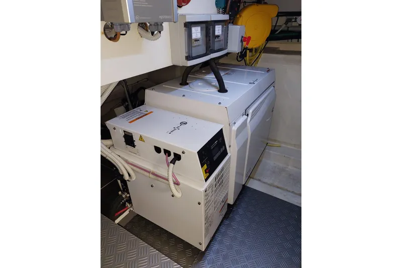  Yacht Photos Pics Engine room of 2021 Ferretti Yachts 670, featuring electrical equipment and wiring.