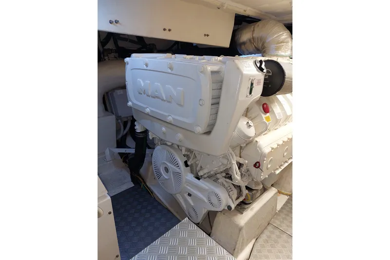  Yacht Photos Pics Engine room of 2021 Ferretti Yachts 670 featuring a MAN engine.