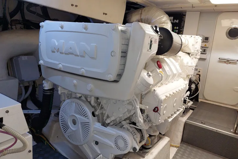  Yacht Photos Pics Engine room of 2021 Ferretti Yachts 670 featuring a MAN engine.