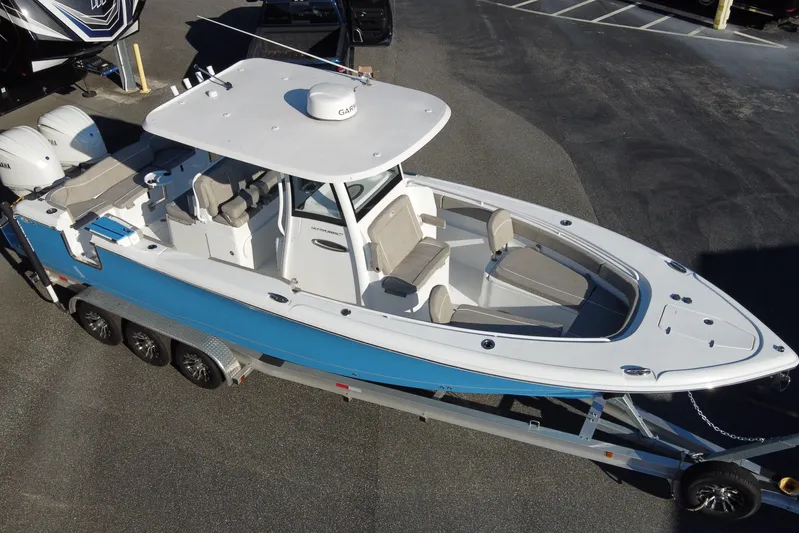  Yacht Photos Pics 2024 Sea Hunt Ultra 305 SE boat on trailer, aerial view.