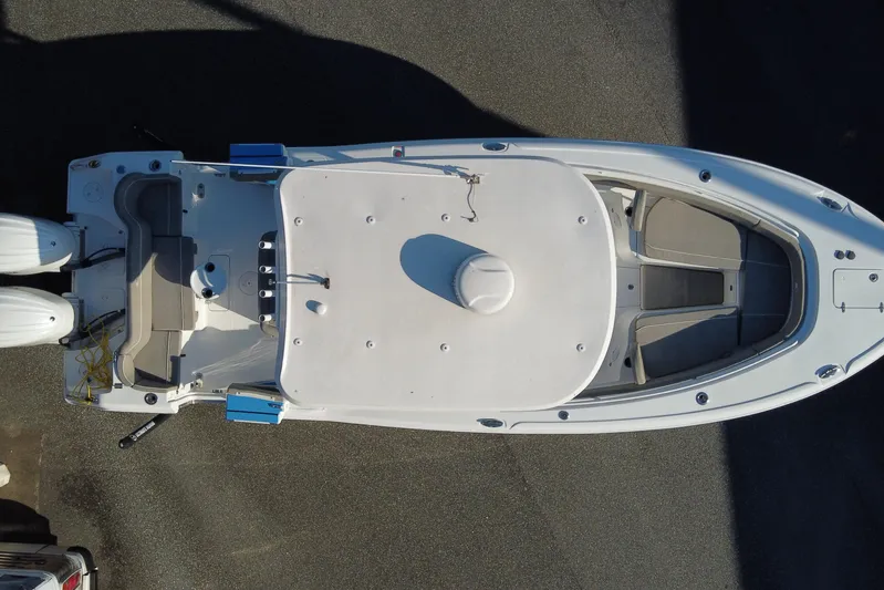  Yacht Photos Pics Top view of 2024 Sea Hunt Ultra 305 SE boat, showcasing deck layout and twin engines.