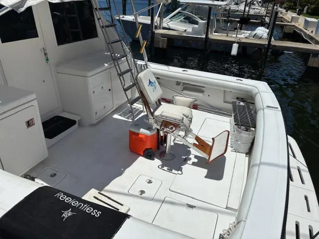 Relentless Yacht Photos Pics 1993 Tiara Yachts 4300 Convertible boat deck with fishing chair and equipment.