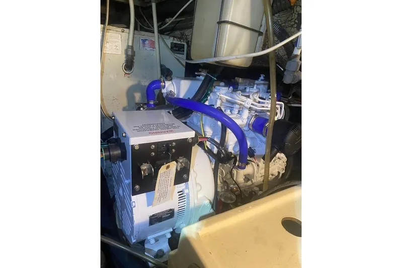 Relentless Yacht Photos Pics Engine room of 1993 Tiara Yachts 4300 Convertible with visible components and wiring.