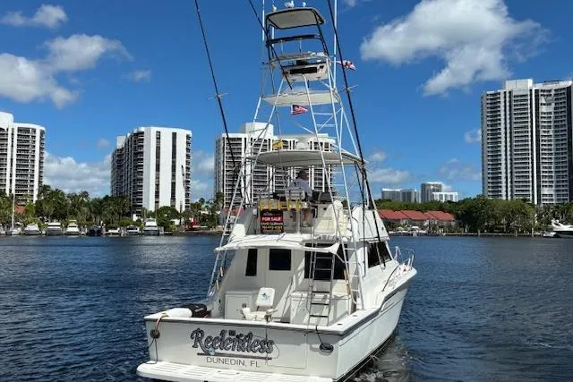 Relentless Yacht Photos Pics 1993 Tiara Yachts 4300 Convertible boat in urban marina setting, Dunedin, FL.