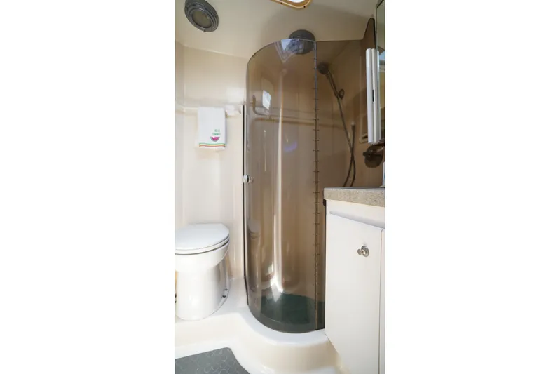 Relentless Yacht Photos Pics Bathroom in 1993 Tiara Yachts 4300 Convertible, featuring shower and toilet.