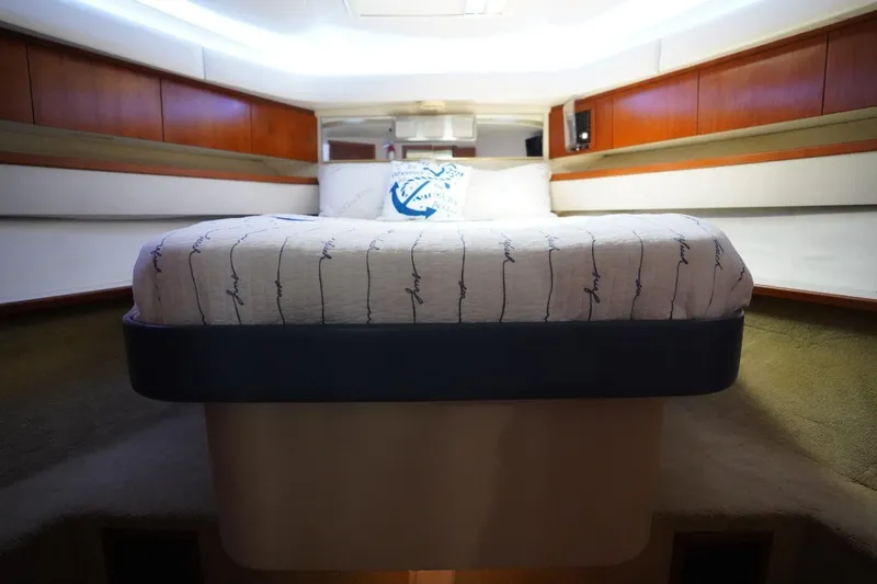 Relentless Yacht Photos Pics Luxurious cabin interior of 1993 Tiara Yachts 4300 Convertible with cozy bed.