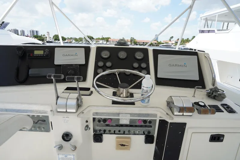 Relentless Yacht Photos Pics Cockpit of 1993 Tiara Yachts 4300 Convertible with Garmin navigation systems.