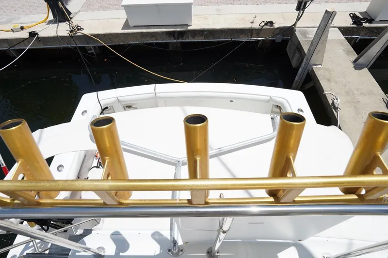 Relentless Yacht Photos Pics 1993 Tiara Yachts 4300 Convertible at dock with gold rod holders.