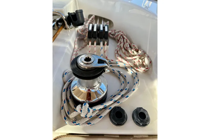 Eos Yacht Photos Pics Sailboat winch with ropes on a 2006 Passport 470 yacht deck.
