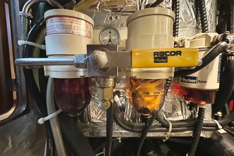 Eos Yacht Photos Pics Diesel fuel filter system in 2006 Passport 470 engine room, featuring Racor Parker components.