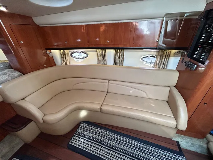  Yacht Photos Pics Luxurious interior of 2015 Crownline 350 SY yacht with beige leather seating.