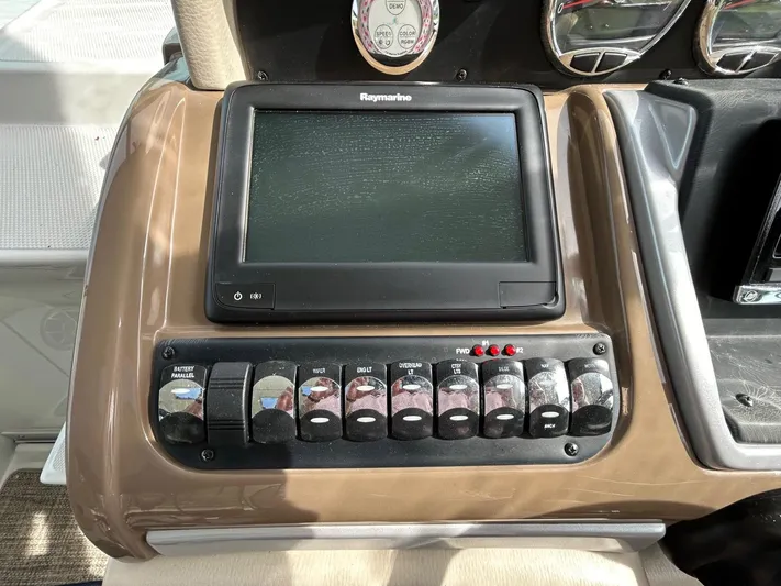  Yacht Photos Pics Control panel of a 2015 Crownline 350 SY boat with Raymarine display.