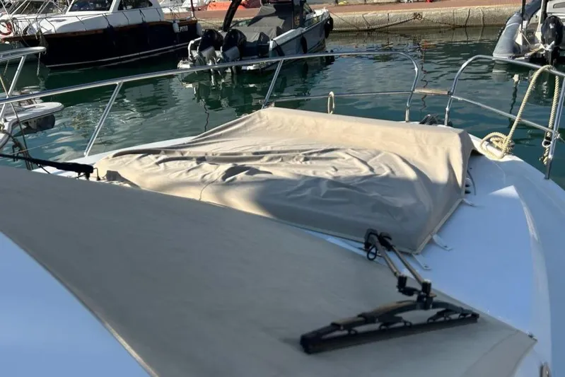  Yacht Photos Pics 2022 Sealine C335V yacht with covered deck, docked in marina.