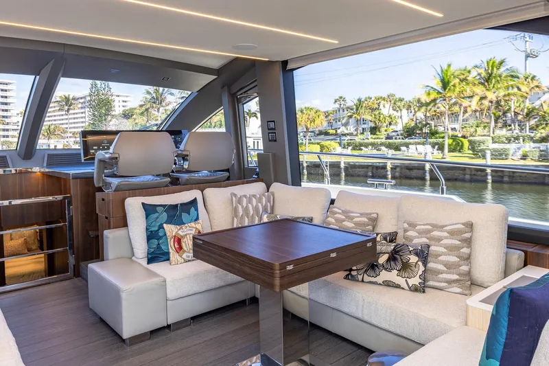  Yacht Photos Pics Luxurious interior of 2024 Astondoa 66 Flybridge yacht with elegant seating and scenic views.