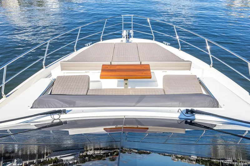  Yacht Photos Pics 2024 Astondoa 66 Flybridge yacht with spacious sun deck and elegant seating area.