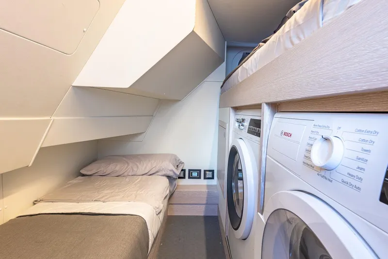  Yacht Photos Pics 2024 Astondoa 66 Flybridge interior with bunk bed and Bosch washer-dryer.