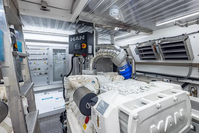  Yacht Photos Pics Engine room of 2024 Astondoa 66 Flybridge yacht with MAN engines and control systems.