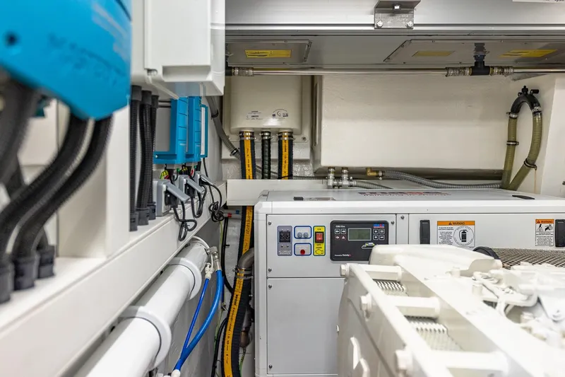  Yacht Photos Pics Engine room of 2024 Astondoa 66 Flybridge yacht, showcasing advanced equipment and systems.