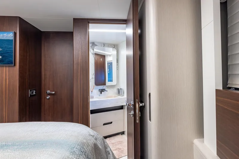  Yacht Photos Pics Luxurious interior of 2024 Astondoa 66 Flybridge yacht with modern bathroom design.