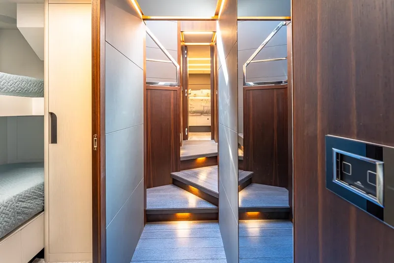  Yacht Photos Pics Luxurious interior of 2024 Astondoa 66 Flybridge yacht with modern wood finishes.