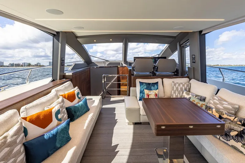  Yacht Photos Pics Luxurious interior of 2024 Astondoa 66 Flybridge yacht with elegant seating and ocean view.